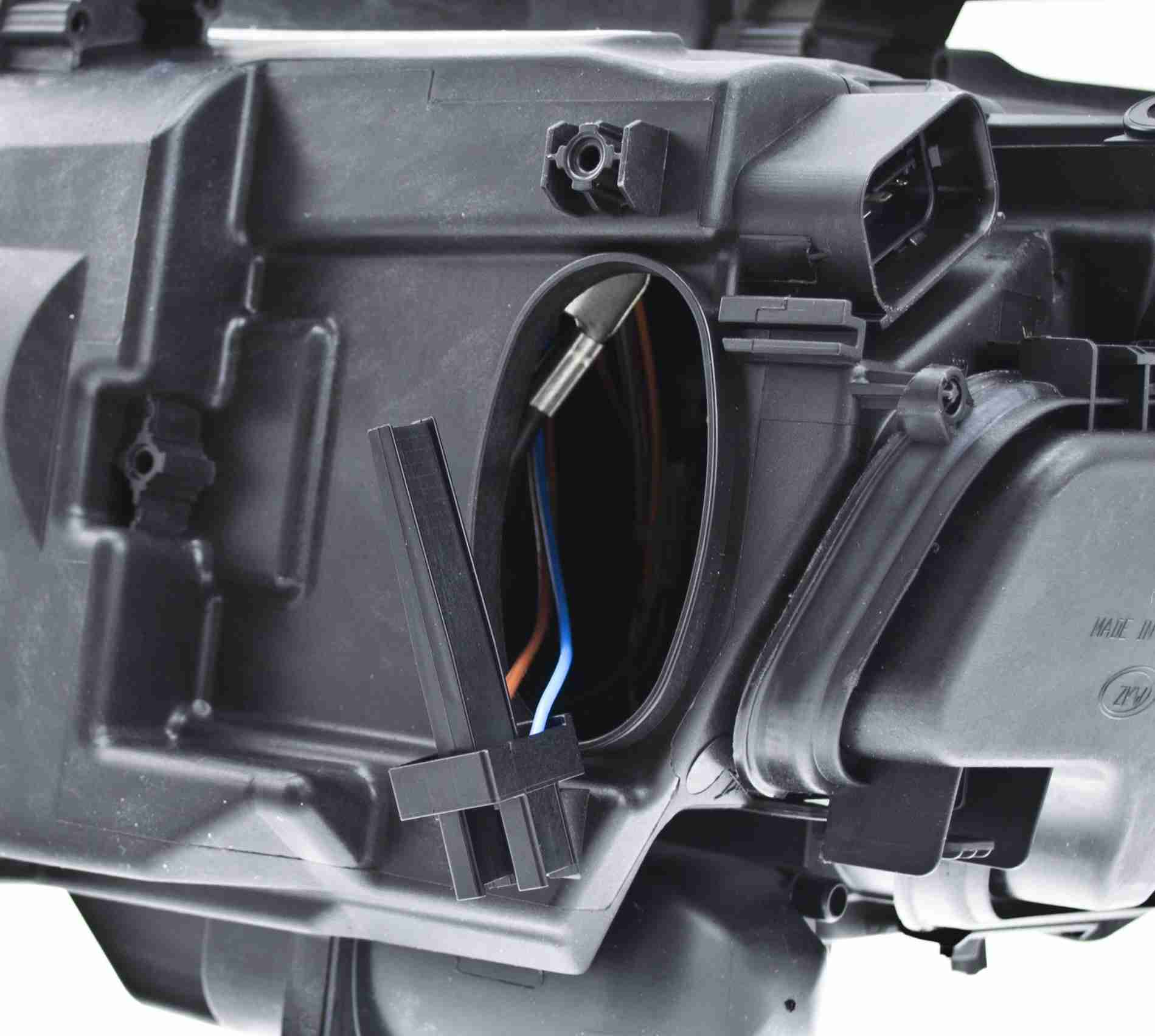 Hella Headlight Assembly 354688061