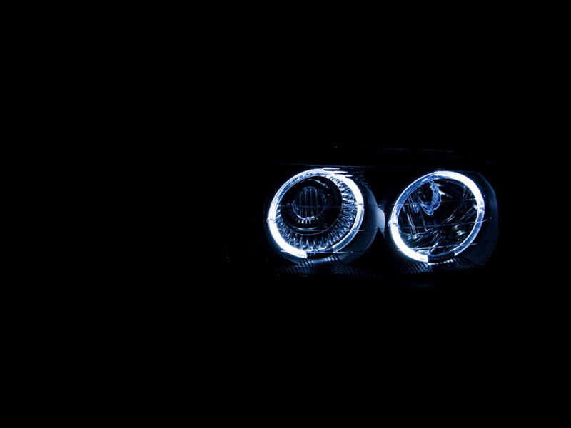 Anzo 1999-2006 Gmc Sierra 1500 Projector Headlights w/ Halo Black 111192 Photo - Mounted
