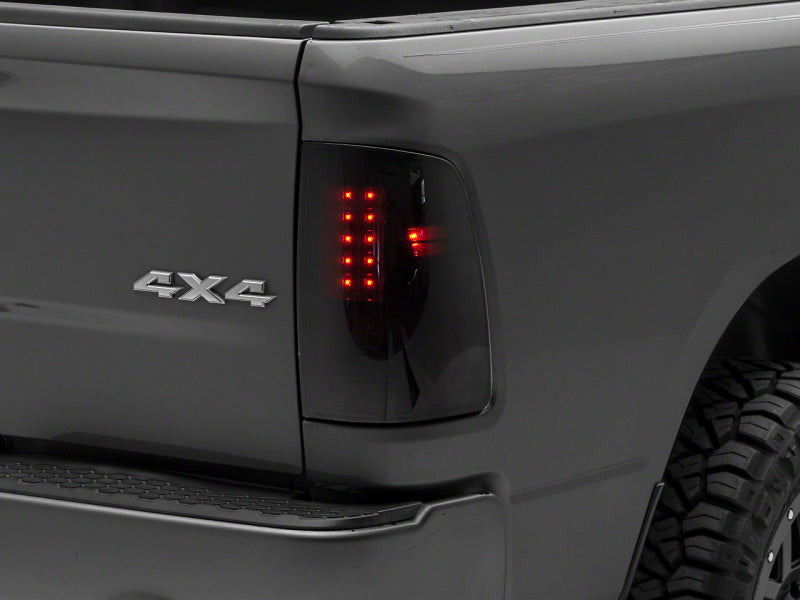 Raxiom 09-18 Dodge RAM 1500/2500/3500 Axial Series LED Tail Lights- BlkHousing- SmokedLens R131283 R131283 Photo - Primary