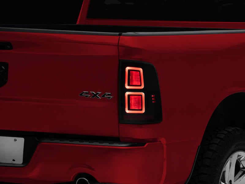 Raxiom 09-18 Dodge RAM 1500 LED Tail Lights- Black Housing (Smoked Lens) R110172 R110172 Photo - Close Up