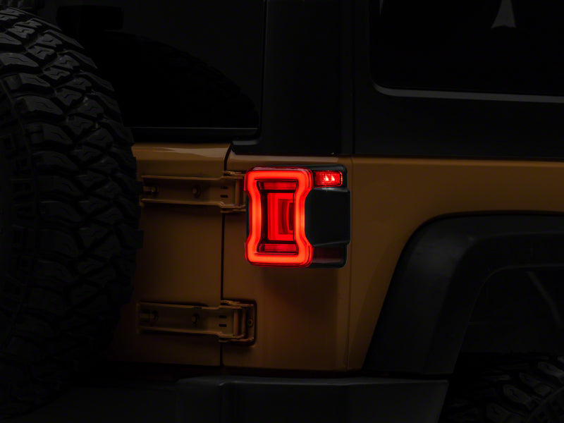 Raxiom 07-18 Jeep Wrangler JK Axial Series JL Style LED Tail Lights- BlkHousing- Red Lens J164242 J164242 Photo - Primary