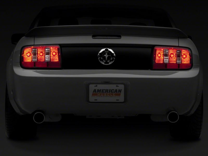Raxiom 05-09 Ford Mustang Coyote Tail Lights- Chrome Housing - Red/Clear Lens 49123 49123 Photo - Close Up