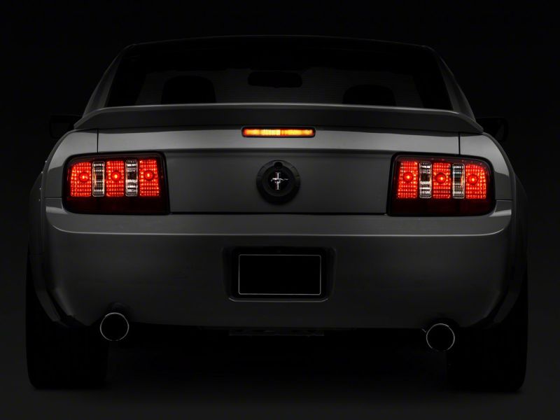 Raxiom 05-09 Ford Mustang Coyote Tail Lights- Blk Housing (Smoked Lens) 49117 49117 Photo - Close Up