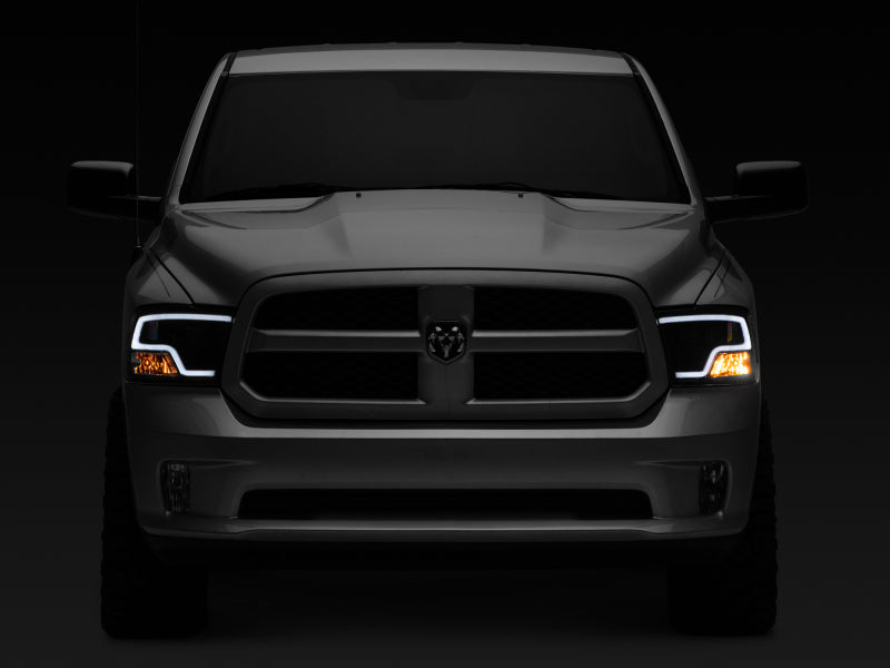 Raxiom 09-18 RAM 1500 LED Halo Projector Headlights- Black Housing (Clear Lens) R111516 R111516 Photo - Close Up