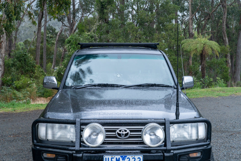 ARB Roof Rack Base with Mount Kit - Flat Rack with Wind Deflector BASE201 BASE201 Photo - Mounted