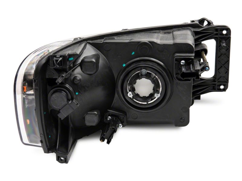 Raxiom 02-05 Dodge RAM 1500 Axial Series OEM Style Rep Headlights- Chrome Housing (Clear Lens) R118008 R118008 Photo - Close Up