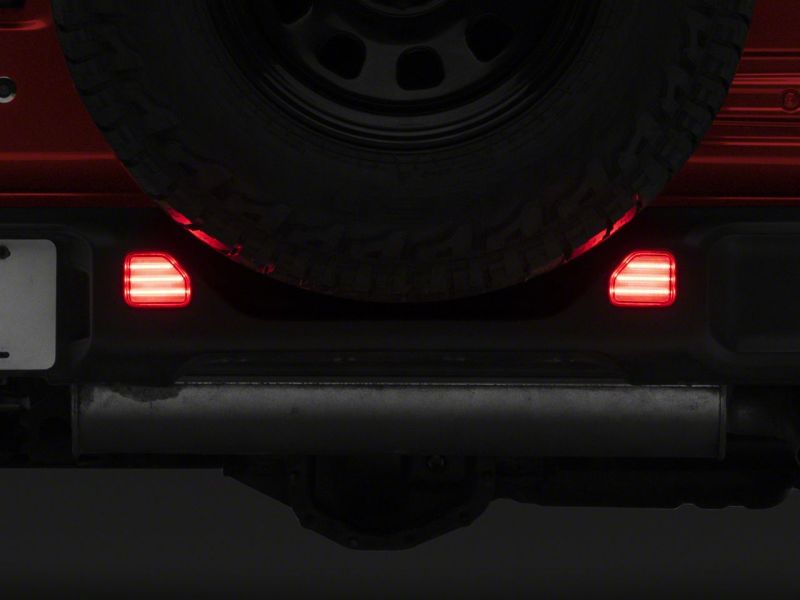 Raxiom 18-23 Jeep Wrangler JL Moab Rubicon Sahara Axial LED Rear Bumper Reflector Lights- Clear J134140-JL J134140-JL Photo - Close Up