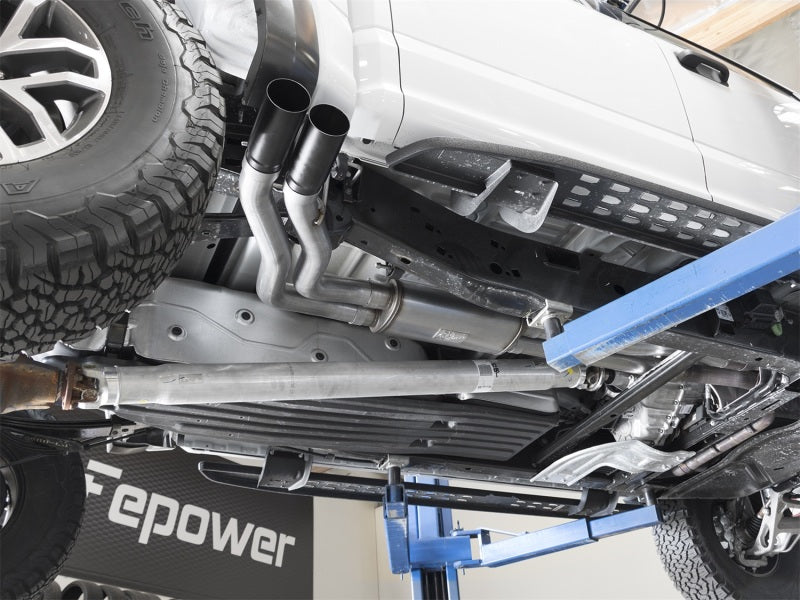 aFe Rebel Series 3in Cat-Back Exhaust System w/ Dual Mid-Side Exit - Black 49-43091-B Photo - Mounted