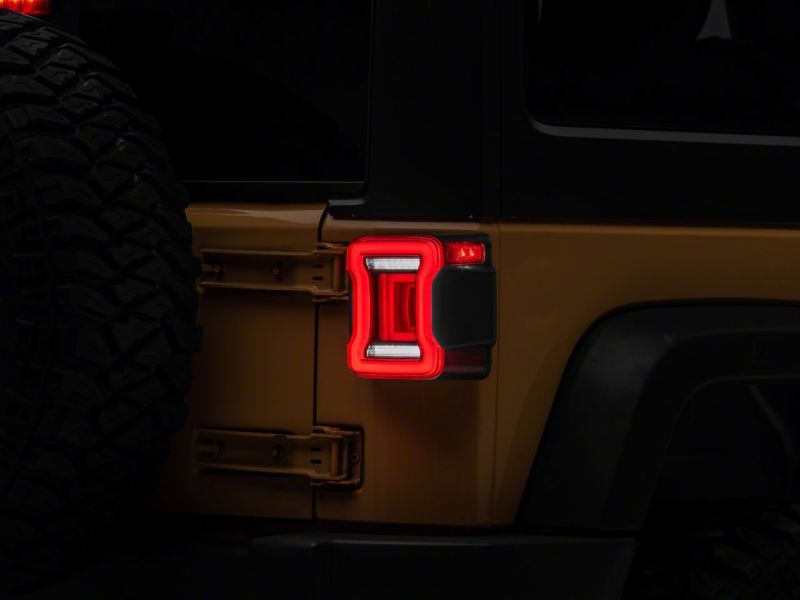 Raxiom 07-18 Jeep Wrangler JK Axial Series JL Style LED Tail Lights- BlkHousing- Red Lens J164242 J164242 Photo - Close Up