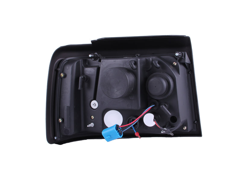 Anzo 1992-1996 Ford F-150 Projector Headlights w/ Halo Black w/ Side Marker 111184 Photo - Unmounted