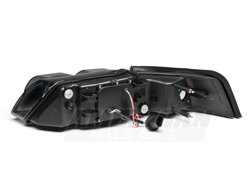 Raxiom 99-04 Ford Mustang Dual LED Halo Projector Headlights- Black Housing (Smoked Lens) 49113 49113 Photo - Close Up