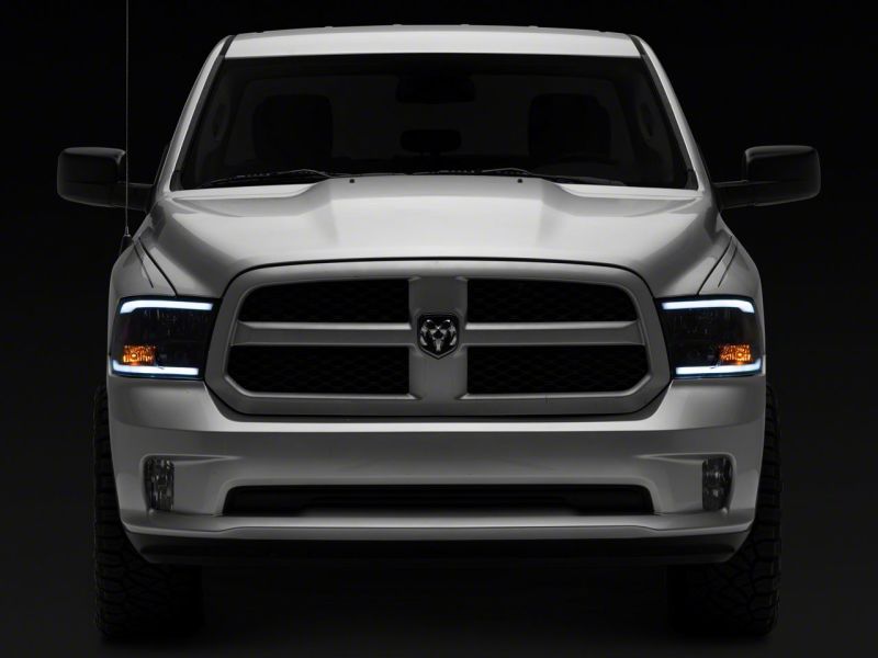 Raxiom 09-18 Dodge RAM 1500/2500/3500 Axial Headlights w/ SEQL LED Bar- Blk Housing (Clear Lens) R131482 R131482 Photo - Close Up