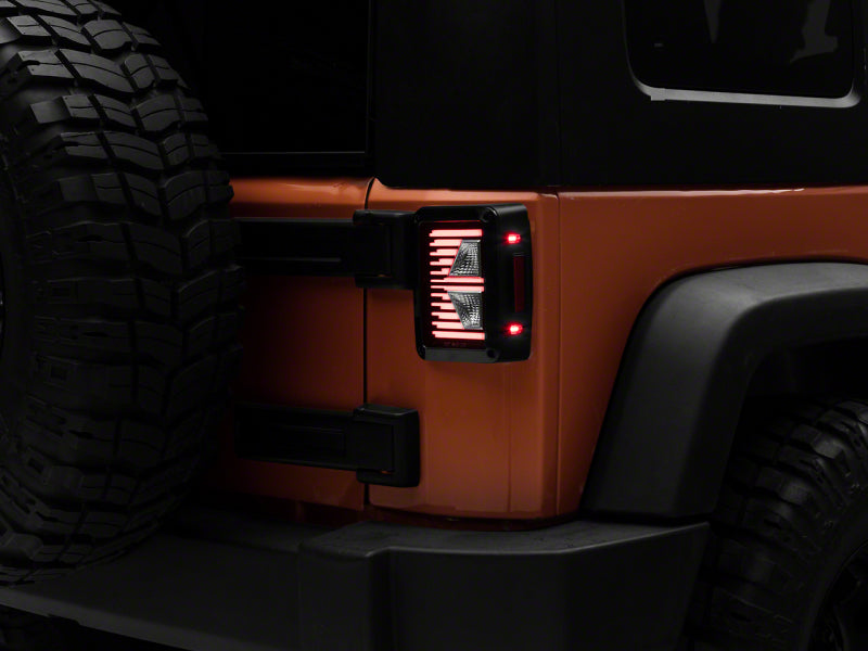 Raxiom 07-18 Jeep Wrangler JK Axial Series Vision LED Tail Lights- Blk Housing (Clear Lens) J130809 J130809 Photo - Primary