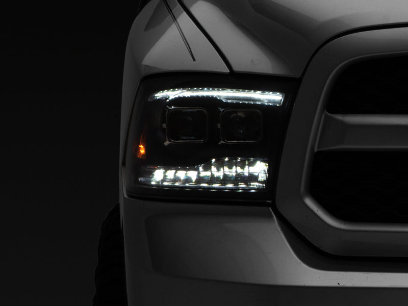 Raxiom 09-18 RAM 1500 LED Projector Headlights w/ Switchback Turn Signals- Blk Housing (Clear Lens) R111520 R111520 Photo - Close Up
