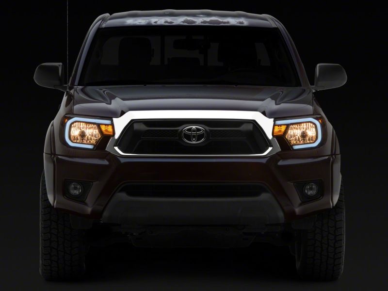 Raxiom 12-15 Toyota Tacoma Axial Series Headlights w/ LED Bar- Blk Housing (Clear Lens) TT21847 TT21847 Photo - Close Up