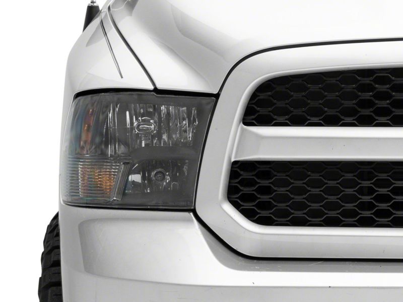 Raxiom 09-18 Dodge RAM 1500 Axial Series Euro Style Headlights w/ Dual Bulb Blk Housing (Clear Lens) R118016 R118016 Photo - Close Up
