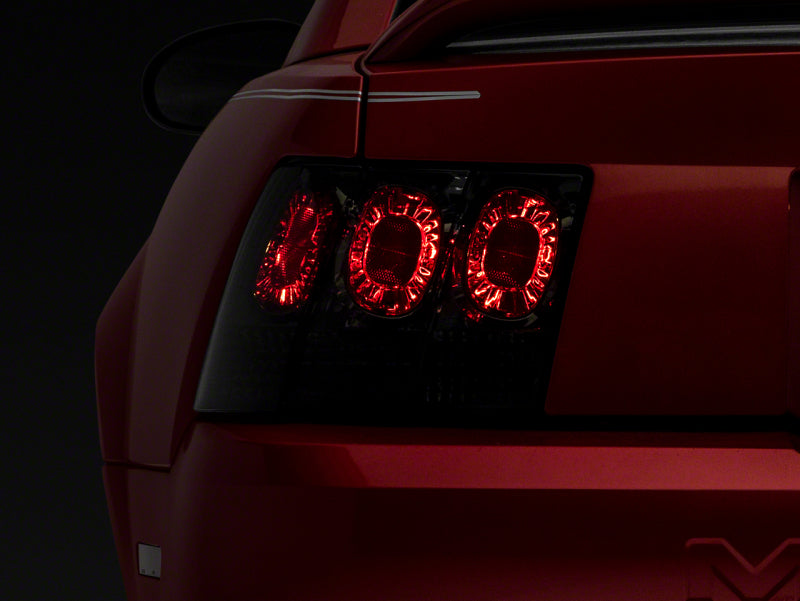 Raxiom 99-04 Ford Mustang Axial Series Altezza Style Tail Lights- Blk Housing (Smoked Lens) 413422 413422 Photo - Primary