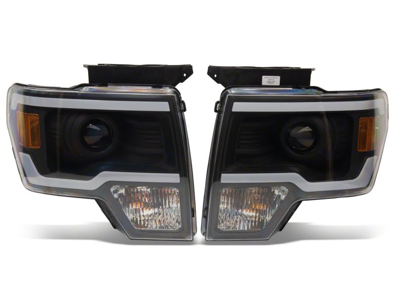 Raxiom 09-14 Ford F-150 Axial Series Projector Headlights w/ LED Light Bar- Blk Housing (Clear Lens) T566369 T566369 Photo - Close Up