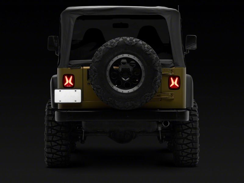 Raxiom 76-06 Jeep CJ7 Wrangler YJ & TJ Gladiator LED Tail Lights- Blk Housing (Smoked Lens) J177410 J177410 Photo - Close Up