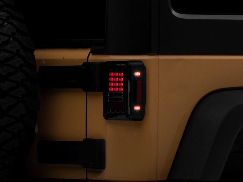 Raxiom 07-18 Jeep Wrangler JK Axial Series LED Tail Lights- Blk Housing (Clear Lens) J141585 J141585 Photo - Close Up
