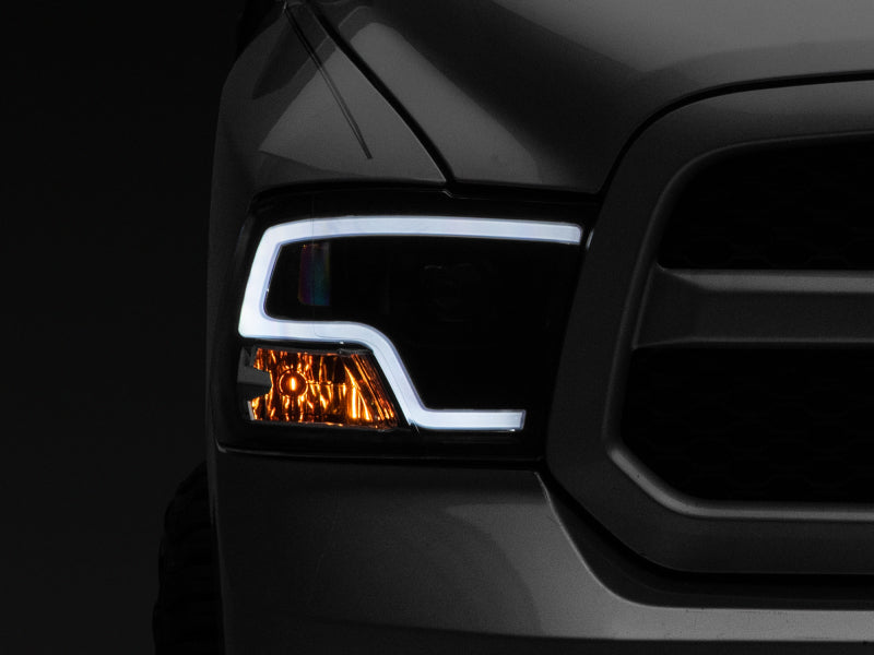 Raxiom 09-18 RAM 1500 LED Halo Projector Headlights- Black Housing (Clear Lens) R111516 R111516 Photo - Close Up