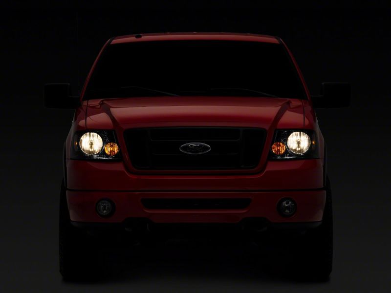 Raxiom 04-08 Ford F-150 Axial Series OEM Style Replacement Headlights- Chrome Housing- Smoked Lens T551342 T551342 Photo - Close Up