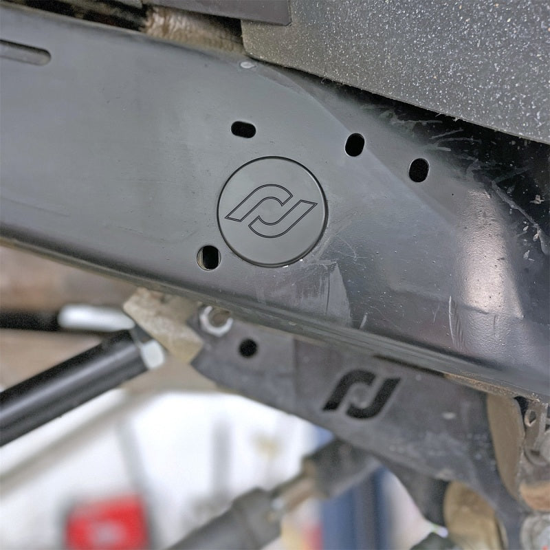 RockJock JL/JT Frame Rail Plugs Frame Behind Front Axle Centerline CNC Machined Black Delrin RJ-600000-103 RJ-600000-103 Photo - Mounted