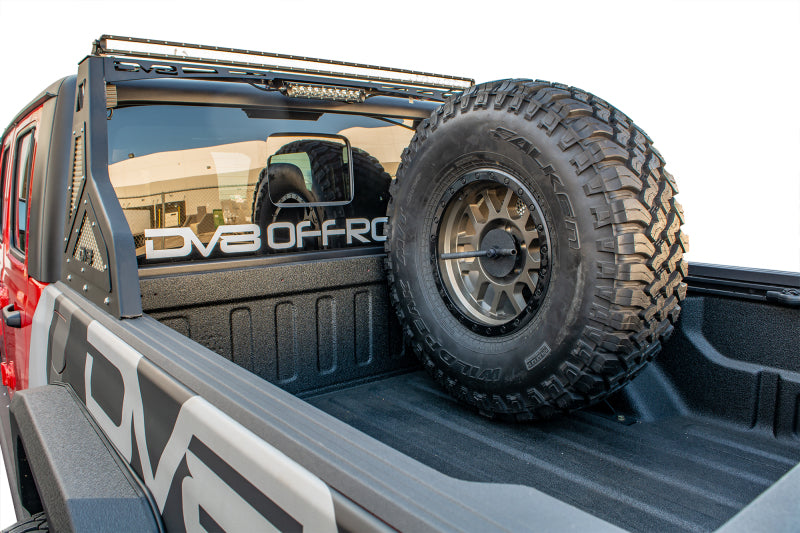 DV8 Offroad 2019+ Jeep Gladiator Universal Stand Up In-Bed Tire Carrier TCGL-02 TCGL-02 Photo - Mounted
