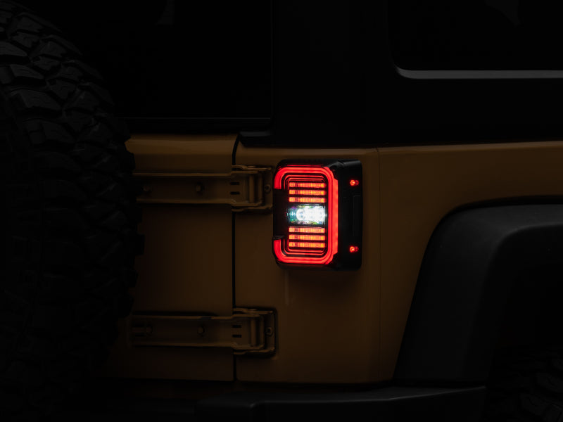 Raxiom 07-18 Jeep Wrangler JK Axial Series LED Halo Tail Lights- Black Housing (Dark Smoked Lens) J138358 J138358 Photo - Close Up