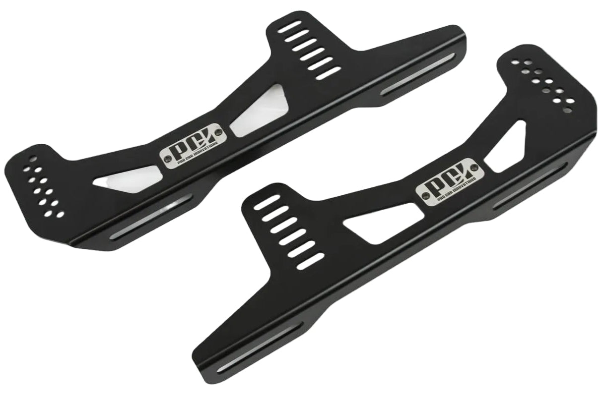 Pair of black metal brackets on a white background