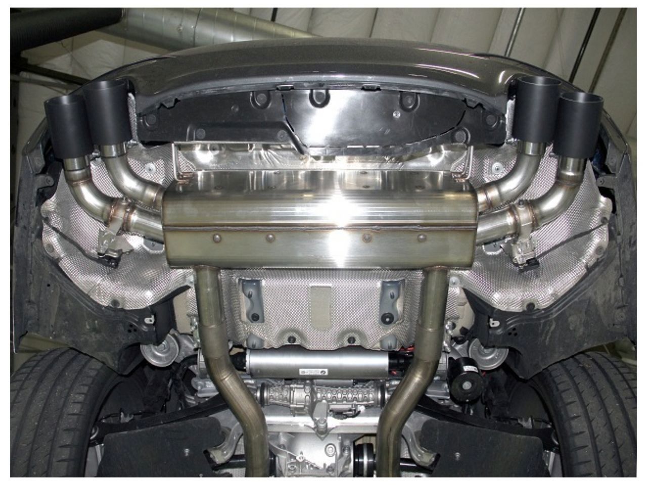 Dinan Freeflow Exhaust with Black Tips for the G30 M550i.