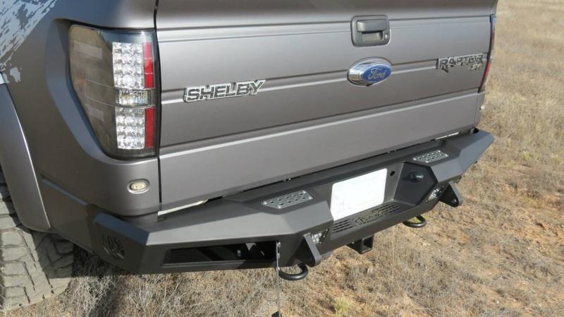Addictive Desert Designs 10-14 Ford F-150 Raptor HoneyBadger Rear Bumper w/ Tow Hooks R017201280103 Main Image
