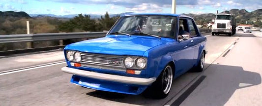Jay Leno in a Datsun 510