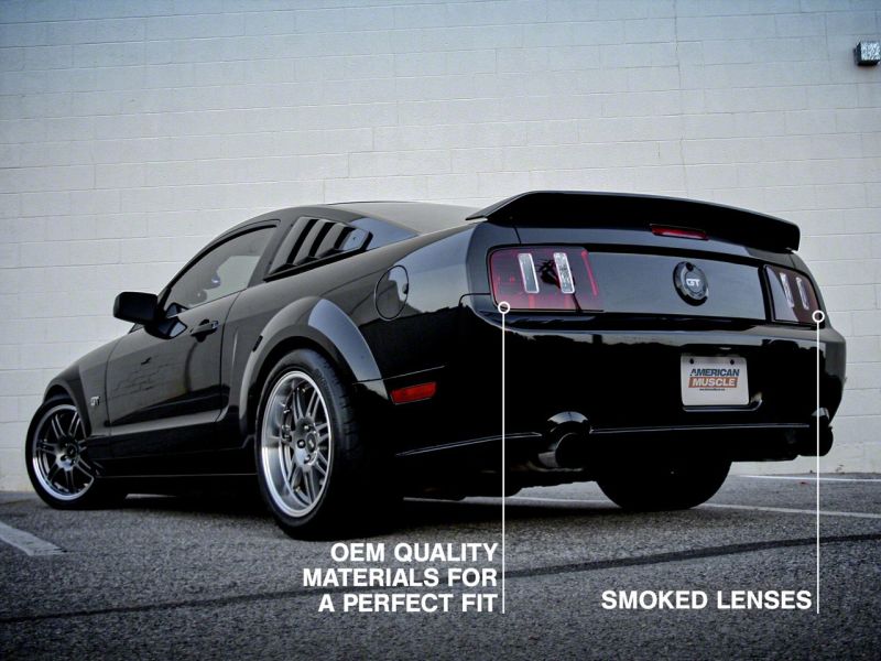 Raxiom 05-09 Ford Mustang Coyote Tail Lights- Blk Housing (Smoked Lens) 49117 49117 Photo - Close Up