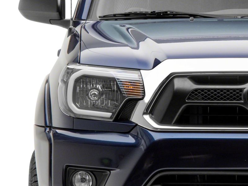 Raxiom 12-15 Toyota Tacoma Axial Series Headlights w/ LED Bar- Blk Housing (Clear Lens) TT21847 TT21847 Photo - Close Up