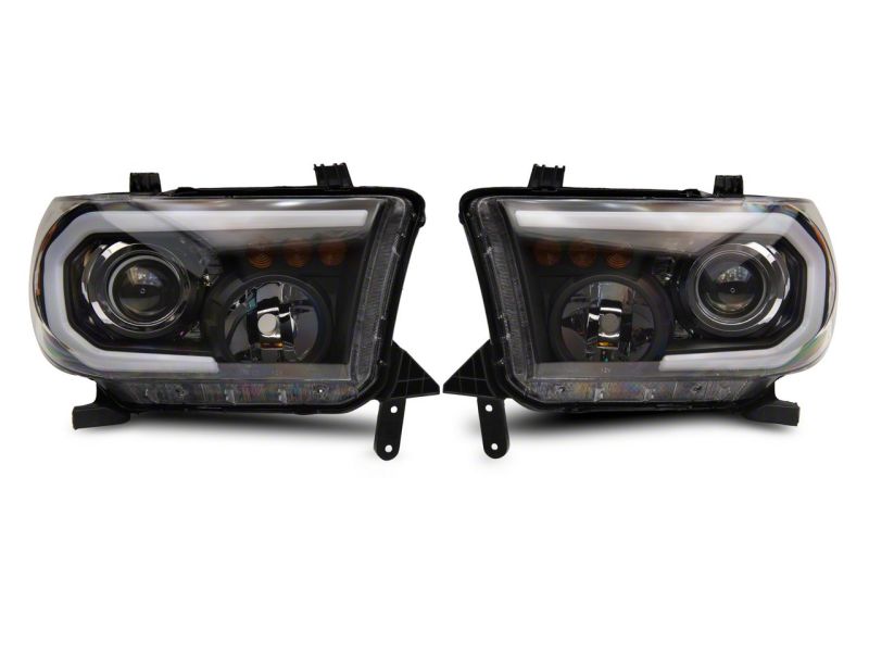 Raxiom 07-13 Toyota Tundra Axial Projector Headlights w/ SEQL LED Bar- Blk Housing (Clear Lens) TU16007