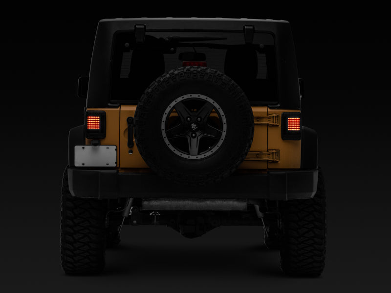 Raxiom 07-18 Jeep Wrangler JK LED Tail Lights- Black Housing (Smoked Lens) J115435 J115435 Photo - Close Up