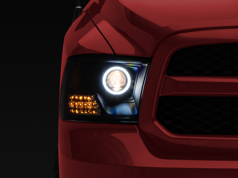 Raxiom 09-18 RAM 1500 Super White LED Halo Projector Headlights- Black Housing (Clear Lens) R110150 R110150 Photo - Primary
