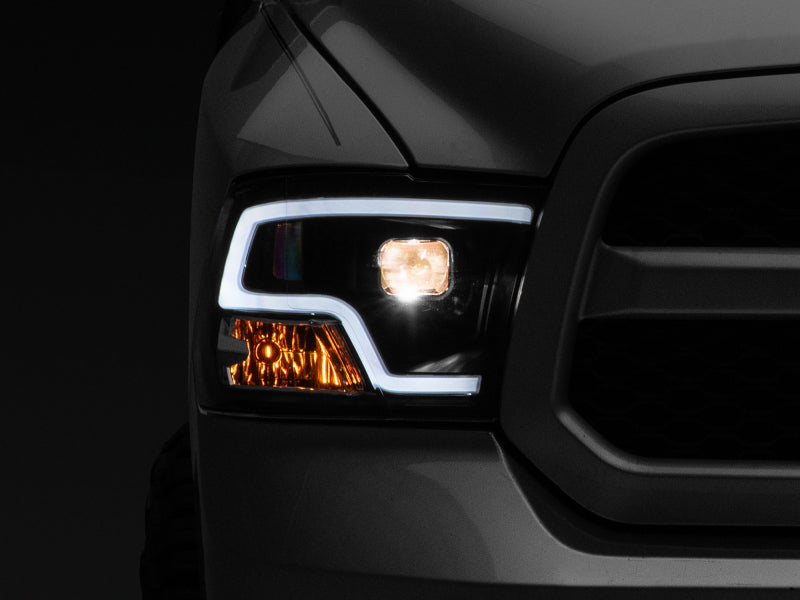 Raxiom 09-18 RAM 1500 LED Halo Projector Headlights- Black Housing (Clear Lens) R111516 R111516 Photo - Primary