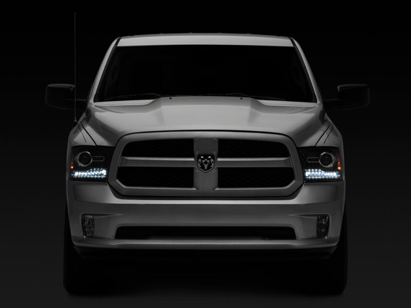 Raxiom 09-18 Dodge RAM 1500 LED Halo Headlights w/Switchback Turn Signals- Blk Housing (Clear Lens) R111518 R111518 Photo - Close Up