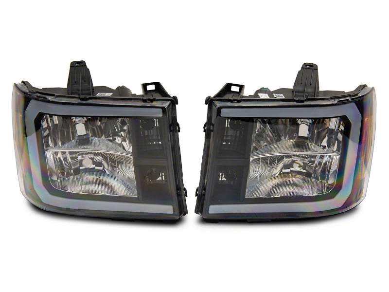 Raxiom 07-13 GMC Sierra 1500 Axial Series Headlights w/ LED Bar- Blk Housing (Clear Lens) S531791