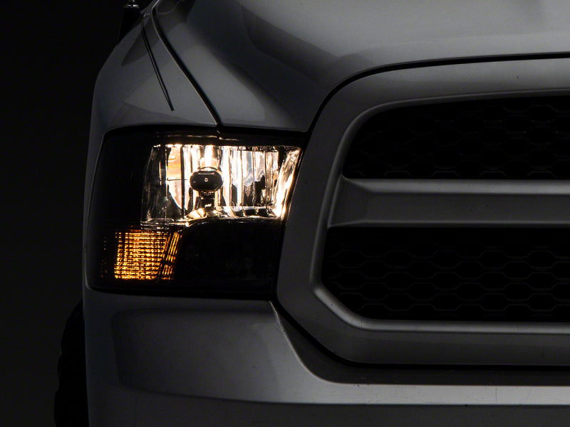 Raxiom 09-18 Dodge RAM 1500 Axial OEM Rep Headlights w/ Dual Bulb- Chrome Housing (Smoked Lens ) R118021 R118021 Photo - Primary