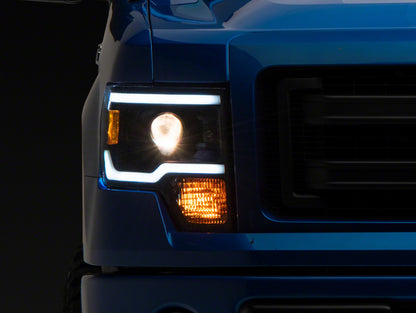 Raxiom 09-14 Ford F-150 Axial Series Projector Headlights w/ LED Light Bar- Blk Housing (Clear Lens) T566369 T566369 Photo - Primary