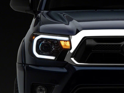 Raxiom 12-15 Toyota Tacoma Axial Series Projector Headlights w/ LED Bar- Blk Housing (Clear Lens) TT21849 TT21849 Photo - Close Up