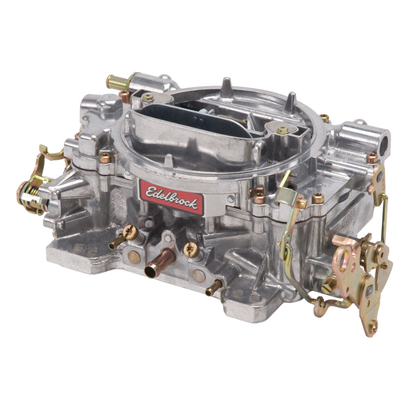 Edelbrock RECONDITIONED CARB #1405, 1 7/8" x 3"  Steel Collector w/ 7-8" Long 9905 Photo - out of package