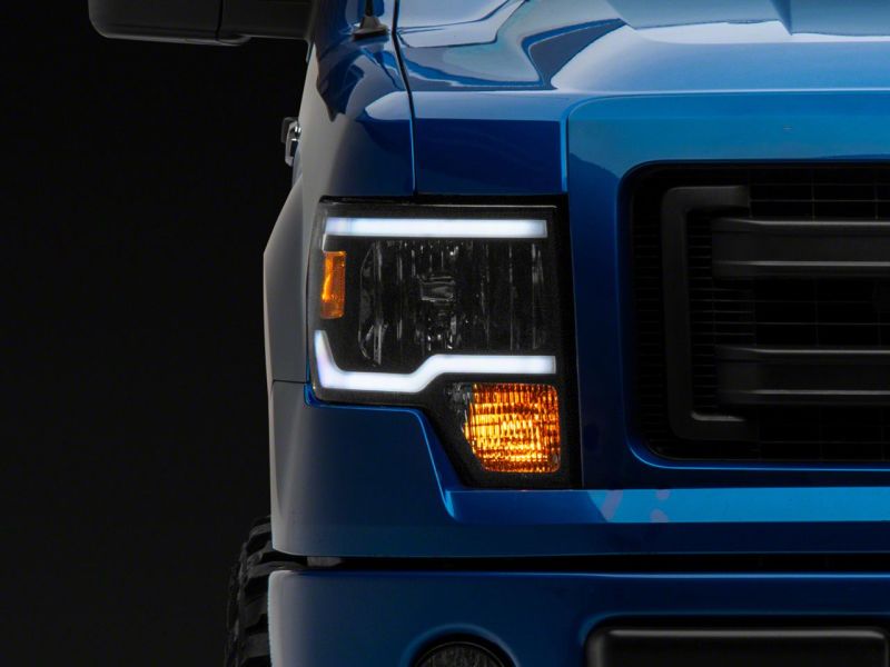 Raxiom 09-14 Ford F-150 Axial Series Headlight w/ SEQL LED Bar- Blk Housing (Clear Lens) T566368 T566368 Photo - Close Up