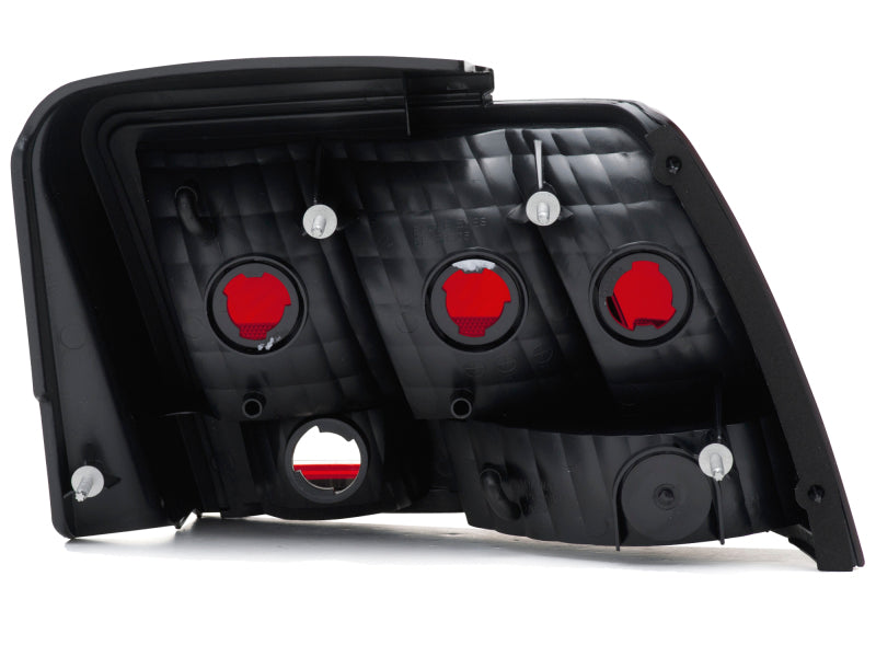 Raxiom 99-04 Ford Mustang Excluding 99-01 Cobra Tail Lights- Black Housing (Smoked Lens) 49080 49080 Photo - Close Up