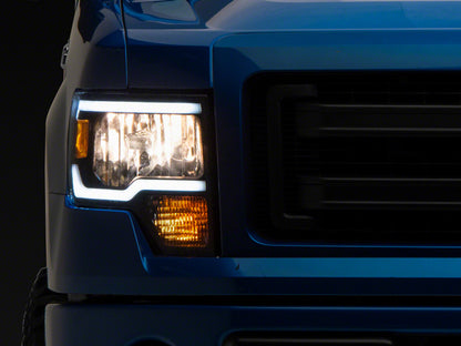 Raxiom 09-14 Ford F-150 Axial Series Headlights w/ LED Bar- Blk Housing (Clear Lens) T566367 T566367 Photo - Primary