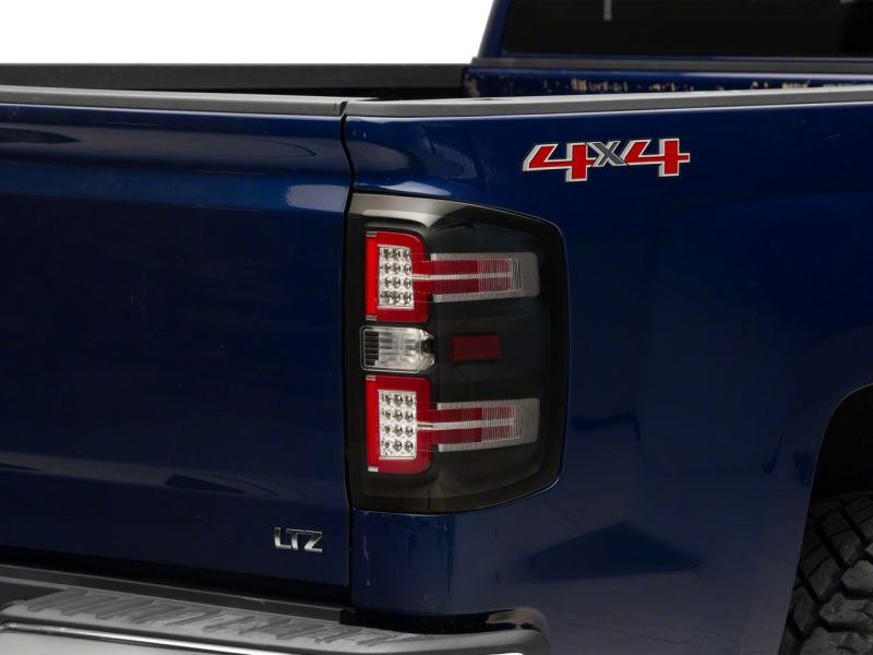 Raxiom 14-18 Chevrolet Silverado 1500 LED Taillights w/ SEQL Turn Signals- Blk Housing (Clear Lens) S114457