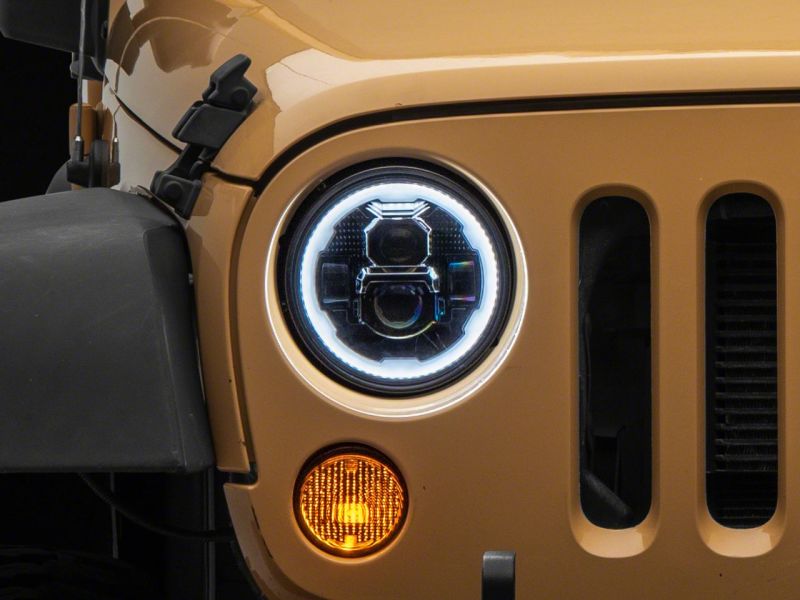 Raxiom 07-18 Jeep Wrangler JK Axial 7-In LED Headlights w/ DRL Turn Signals- Blk Housing (Clear) J173078 J173078 Photo - Close Up